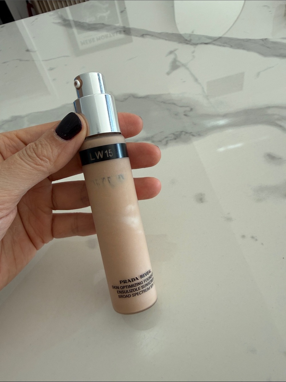 Prada Reveal Skin Optimizing Foundation LW15